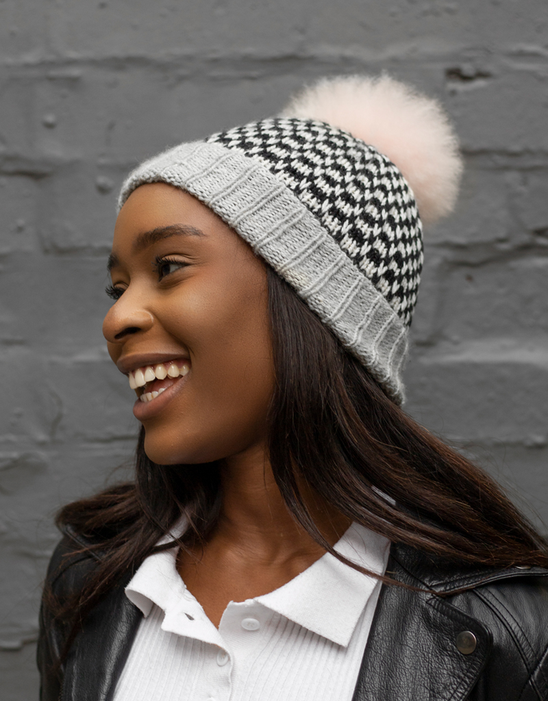 Black fluffy pom pom hat outlet