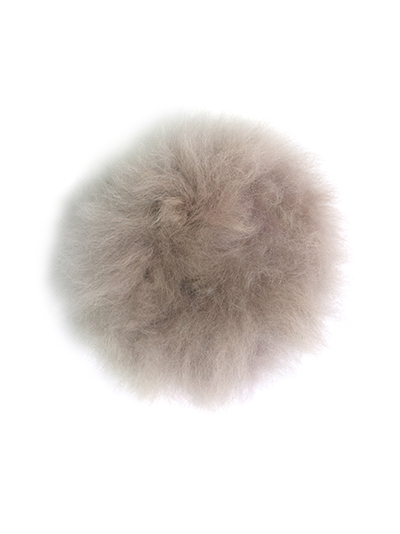 Alpaca Fur Pompoms: the fluffiest finish to a hat scarf.