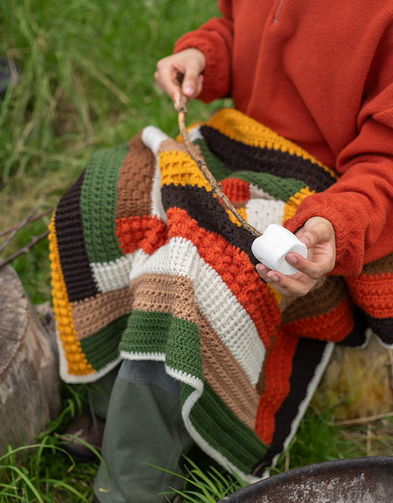 Multi coloured knitted blanket deals